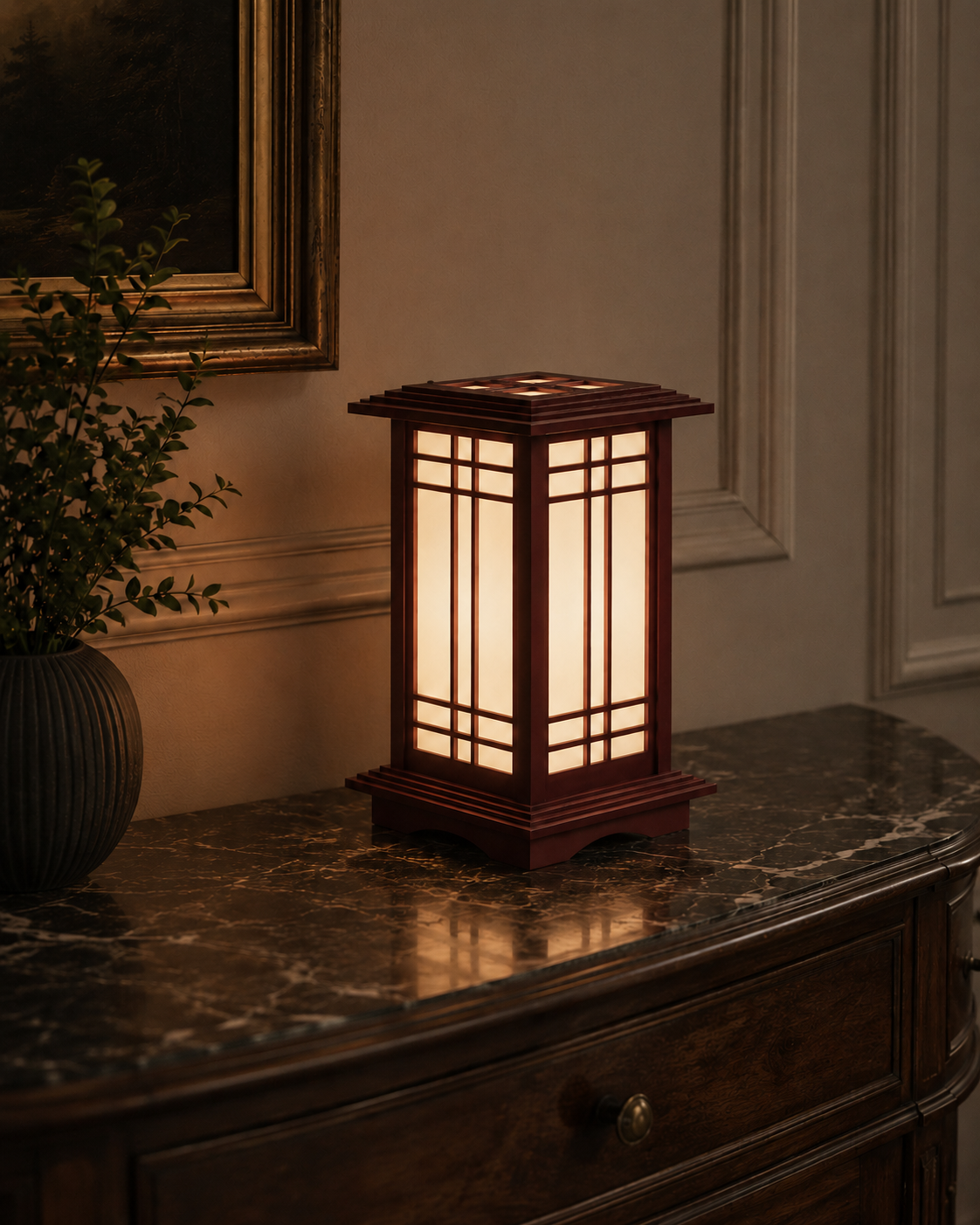 Classic Rosewood Kyoto Shoji lamp glowing warmly on a dark console