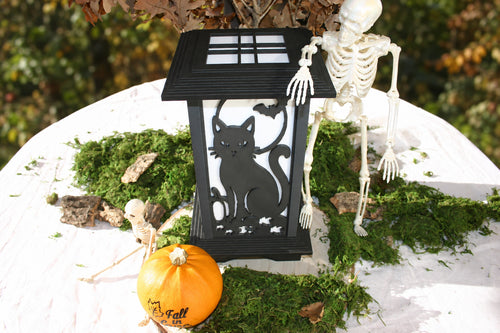 Kyoto Lamp with Black Cat and Moon Halloween wall panel in an autumn display