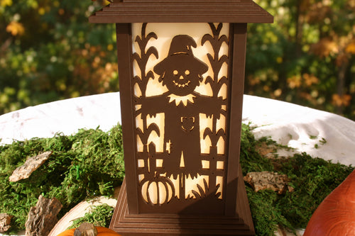 Harvest Scarecrow interchangeable autumn wall panel displayed on a Kyoto Lamp
