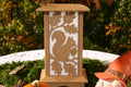 Squirrel and Acorn interchangeable autumn wall panel displayed on a Kyoto Lamp