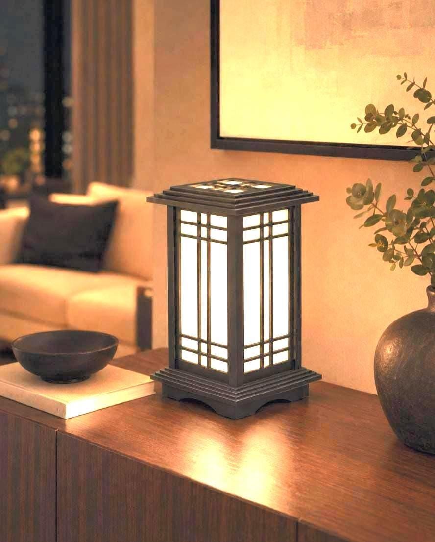 The Prairie Beacon table lantern pairs an inviting wood-tone finish with the sculptural elegance of American-inspired architecture. Slender corner posts, intricate geometric latticework, and translucent panels rise from a square base to a gracefully overhanging roof. Thoughtfully designed and 3D printed, its layered details create a distinctive statement piece, bringing warmth, character, and architectural beauty to a bedside table, bookshelf, or favorite corner.